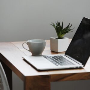 image of laptop and coffee on desk